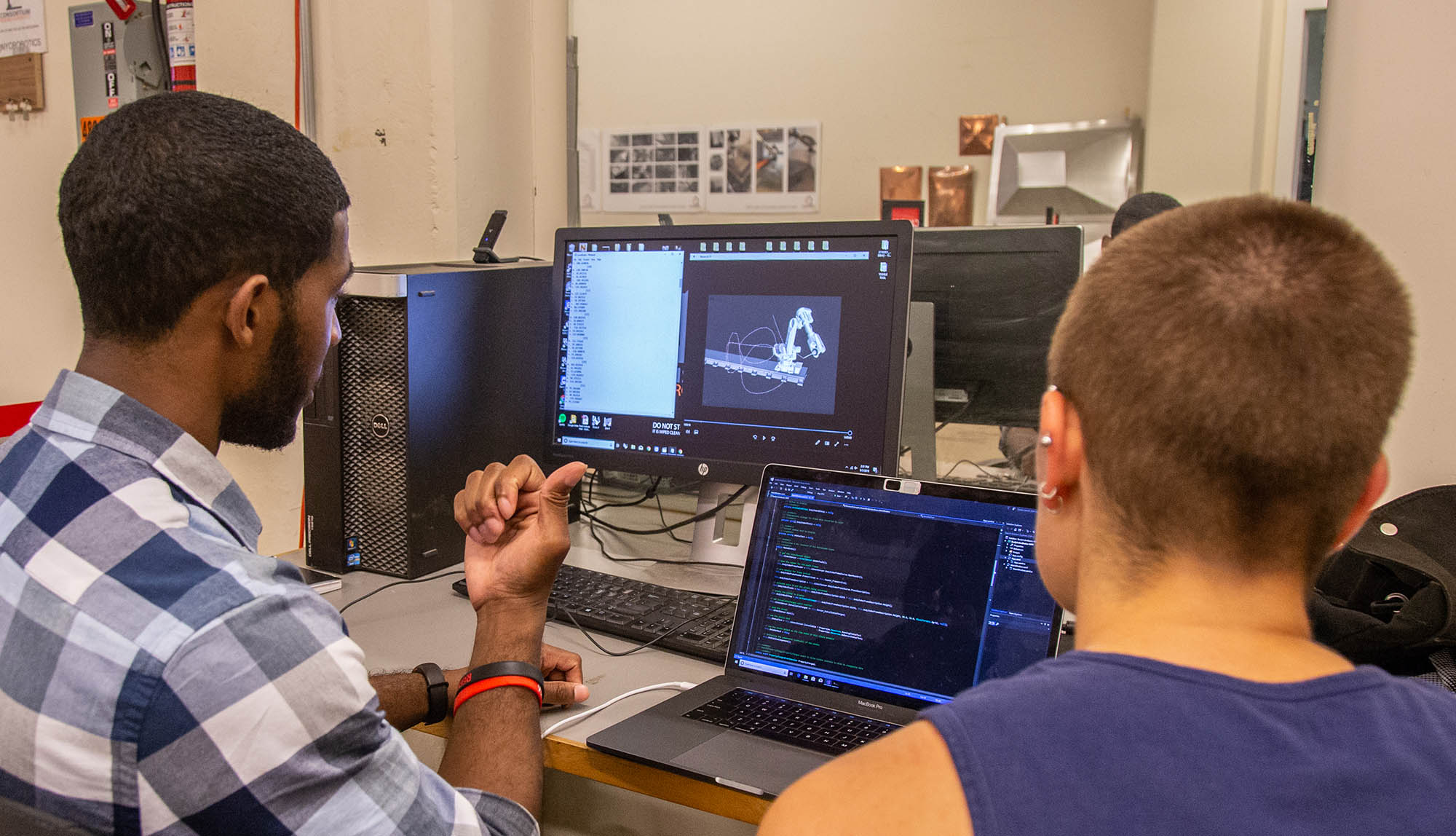 Engineers working in a robotics lab